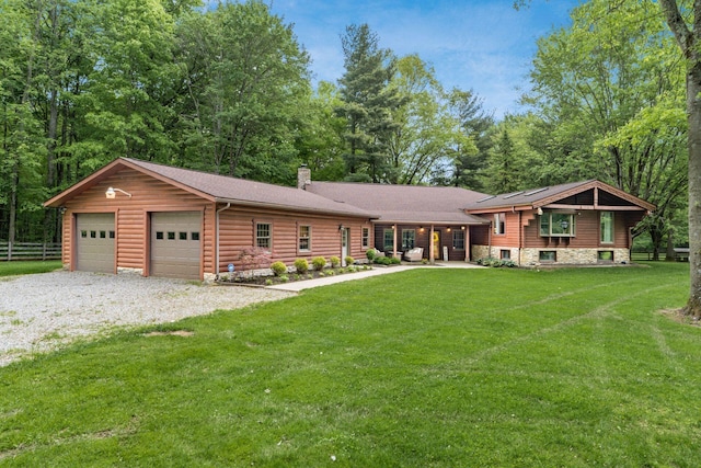 1001 Eckard Rd, Centerburg, OH 43011 - view of front of home with a chimney and a garage