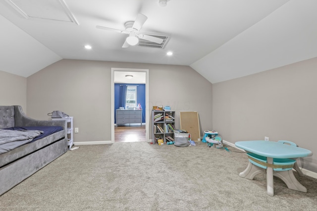 game room with ceiling fan, carpet flooring, baseboards, and lofted ceiling