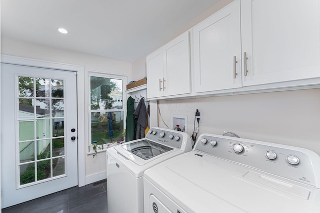 washroom featuring cabinet space, washer and clothes dryer, and recessed lighting