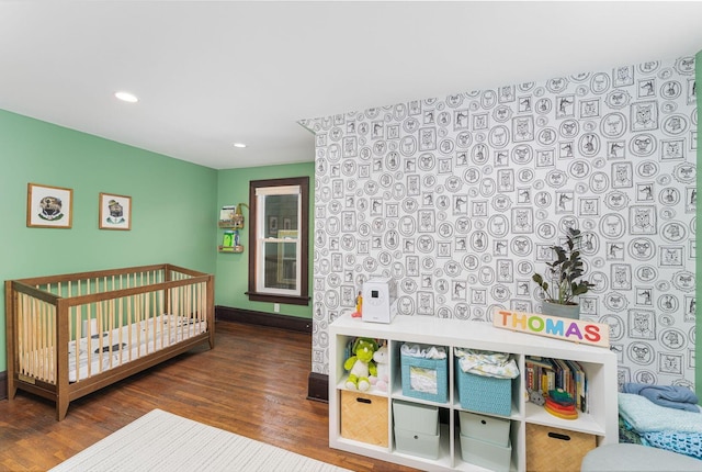 bedroom with wood finished floors, baseboards, and recessed lighting
