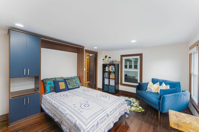 bedroom featuring recessed lighting, baseboards, and dark wood-style floors