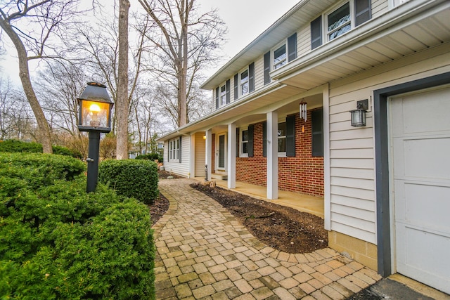 view of property exterior featuring a garage