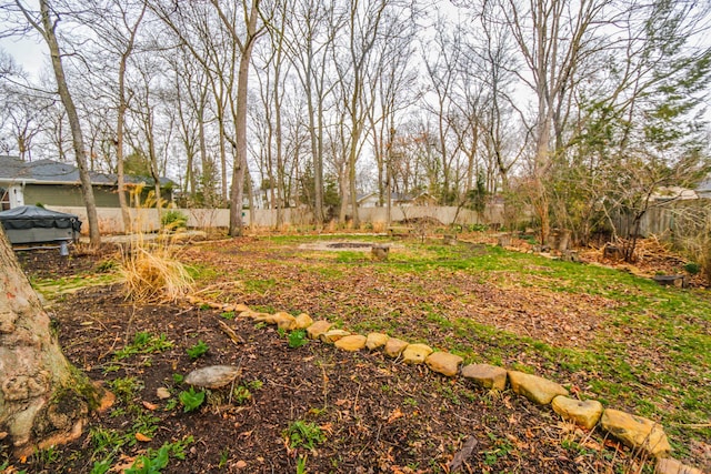 view of yard featuring fence