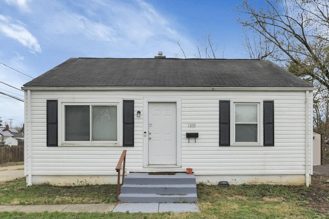 1333 Carolyn Ave, Columbus, OH 43224 - bungalow-style home featuring roof with shingles and fence