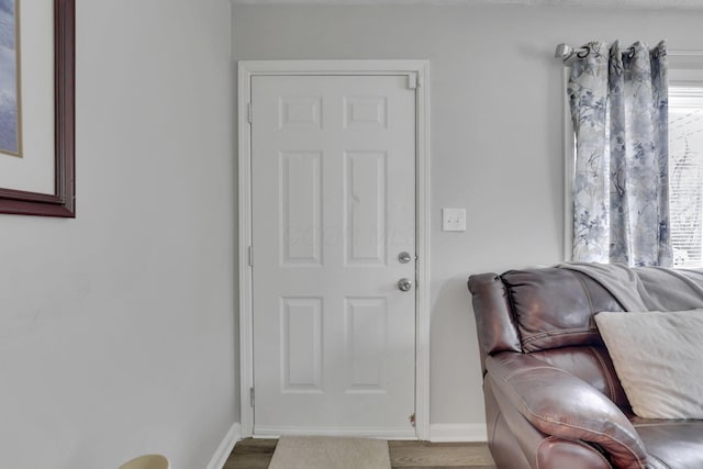 1333 Carolyn Ave, Columbus, OH 43224 - foyer featuring wood finished floors, baseboards, and plenty of natural light