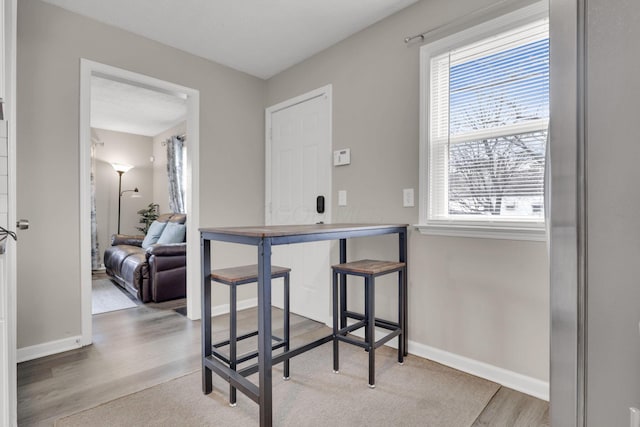 1333 Carolyn Ave, Columbus, OH 43224 - dining room with baseboards and wood finished floors