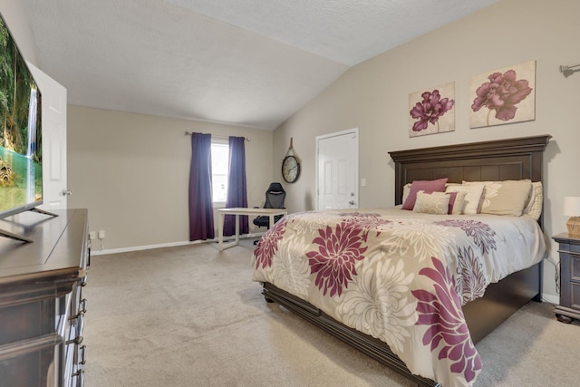 1333 Carolyn Ave, Columbus, OH 43224 - bedroom with baseboards, carpet, a textured ceiling, and vaulted ceiling