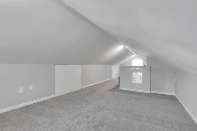 1333 Carolyn Ave, Columbus, OH 43224 - bonus room featuring baseboards, vaulted ceiling, and carpet floors