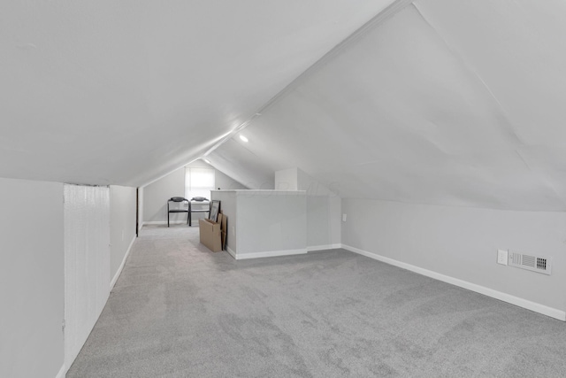 1333 Carolyn Ave, Columbus, OH 43224 - bonus room featuring visible vents, carpet floors, baseboards, and lofted ceiling