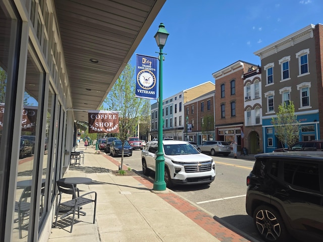 view of street featuring sidewalks and street lighting