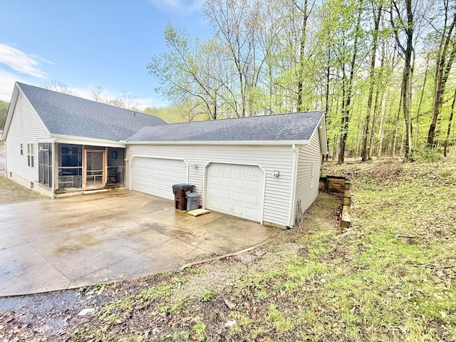 garage featuring driveway