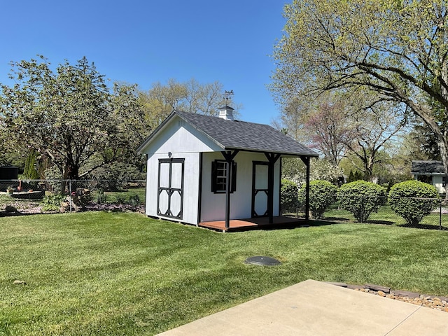 view of shed featuring a fenced backyard