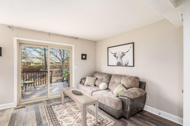 500 Foxtrail Cir E, Westerville, OH 43081 - living room with visible vents, baseboards, and dark wood-style flooring