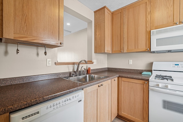 692 Parkbluff Way, Lewis Center, OH 43035 - kitchen with white appliances, dark countertops, light brown cabinets, and recessed lighting