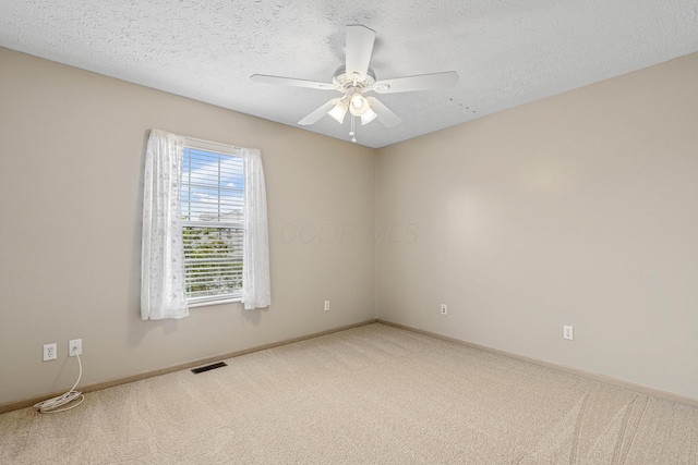 692 Parkbluff Way, Lewis Center, OH 43035 - carpeted spare room with a ceiling fan and a textured ceiling
