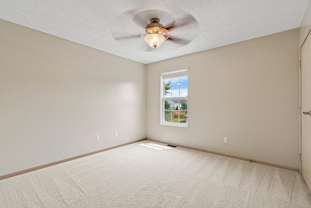 692 Parkbluff Way, Lewis Center, OH 43035 - unfurnished room with carpet floors, a ceiling fan, and a textured ceiling