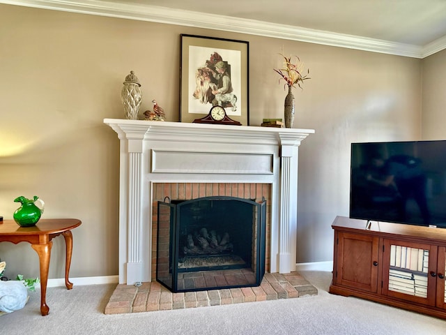 unfurnished living room with baseboards, a brick fireplace, carpet flooring, and crown molding