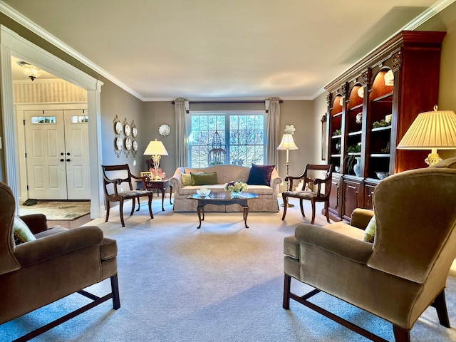 carpeted living area featuring crown molding