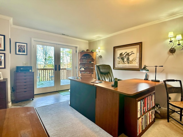 carpeted office space featuring tile patterned floors, french doors, visible vents, and ornamental molding