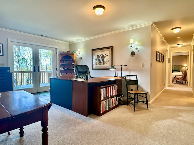 office space featuring visible vents, french doors, carpet, crown molding, and baseboards