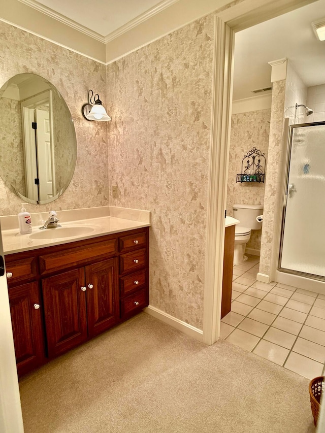 bathroom with vanity, wallpapered walls, a stall shower, crown molding, and toilet