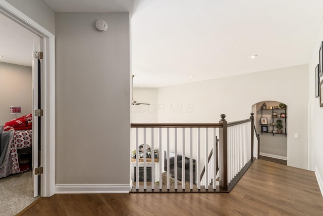 205 Partridge Ct, Pickerington, OH 43147 - hallway featuring an upstairs landing, wood finished floors, and baseboards