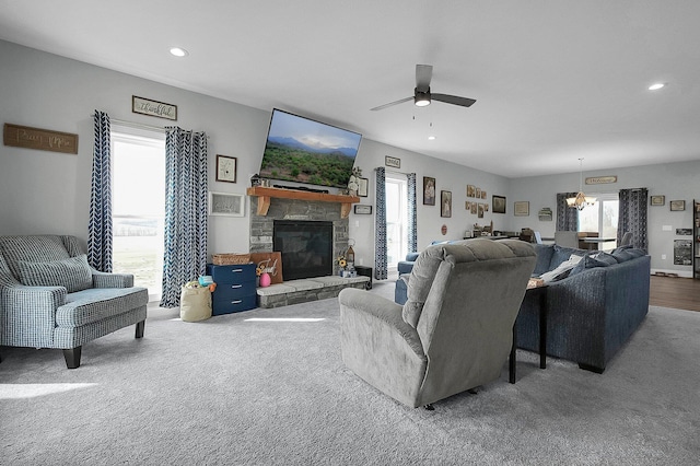 14690 S Perry Rd, Laurelville, OH 43135 - living area with a wealth of natural light, a stone fireplace, and ceiling fan