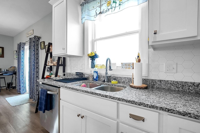 14690 S Perry Rd, Laurelville, OH 43135 - kitchen with a sink, backsplash, stainless steel dishwasher, wood finished floors, and white cabinetry