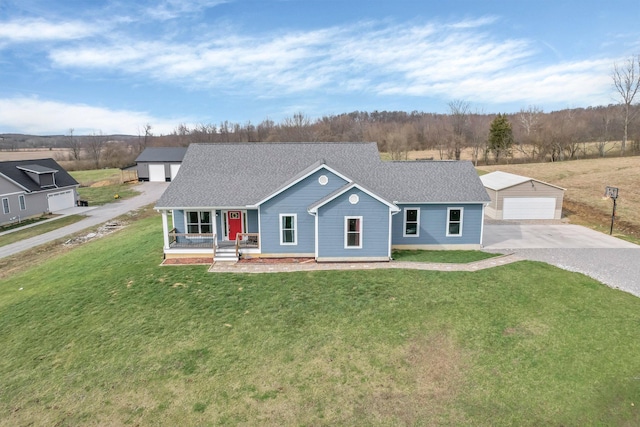 14690 S Perry Rd, Laurelville, OH 43135 - ranch-style house with an outbuilding, roof with shingles, gravel driveway, a front lawn, and a detached garage