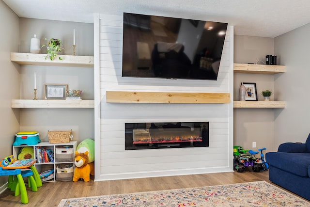 268 Aaron Dr, Delaware, OH 43015 - living area with wood finished floors and a large fireplace