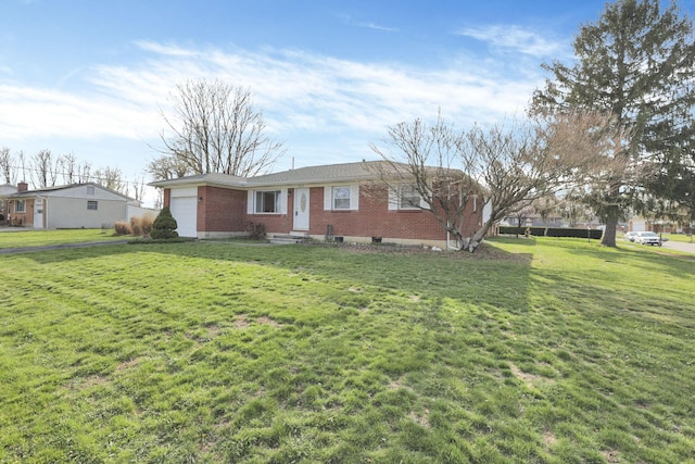 ranch-style home featuring an attached garage, brick siding, and a front yard