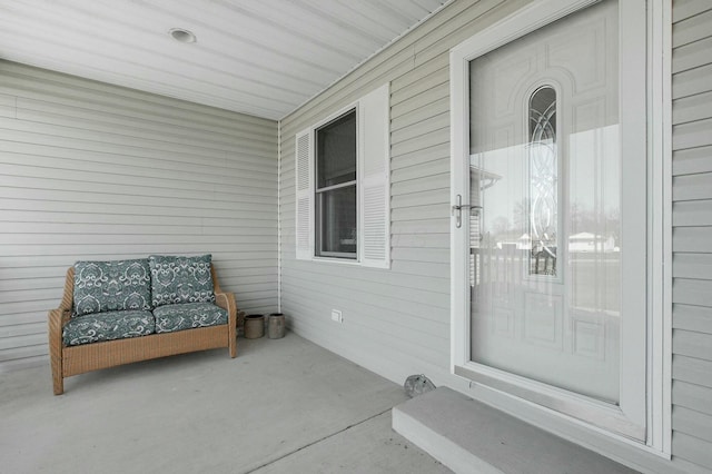 property entrance featuring covered porch