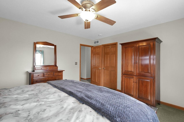 carpeted bedroom featuring a ceiling fan, baseboards, and visible vents