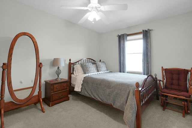 carpeted bedroom with a ceiling fan