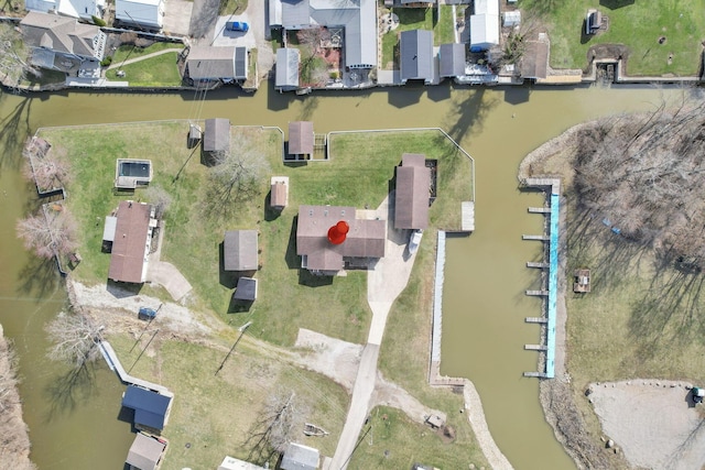 aerial view with a residential view and a water view