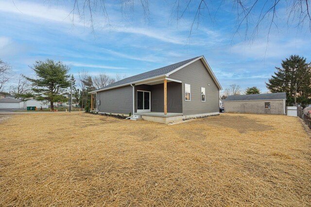 1651 Hillcrest Ave, Obetz, OH 43207 - rear view of property featuring a lawn