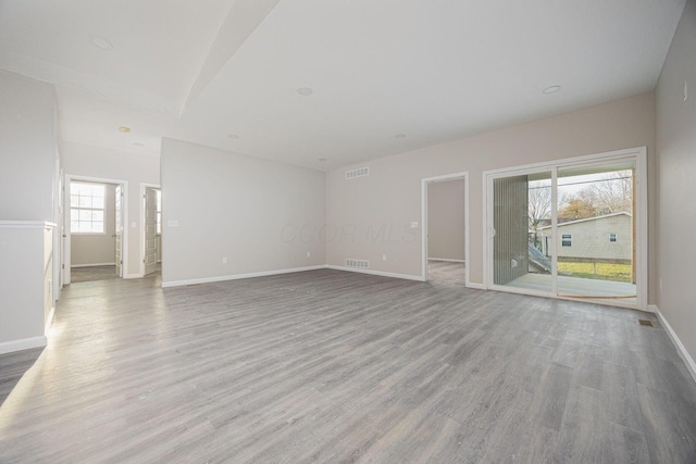 1651 Hillcrest Ave, Obetz, OH 43207 - unfurnished living room with visible vents, baseboards, and wood finished floors