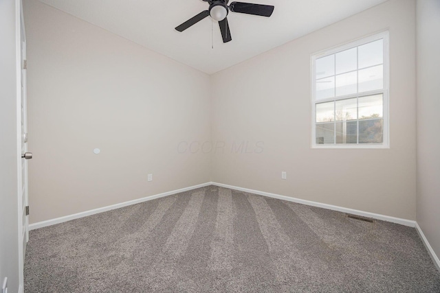 1651 Hillcrest Ave, Obetz, OH 43207 - carpeted empty room with visible vents, baseboards, and a ceiling fan