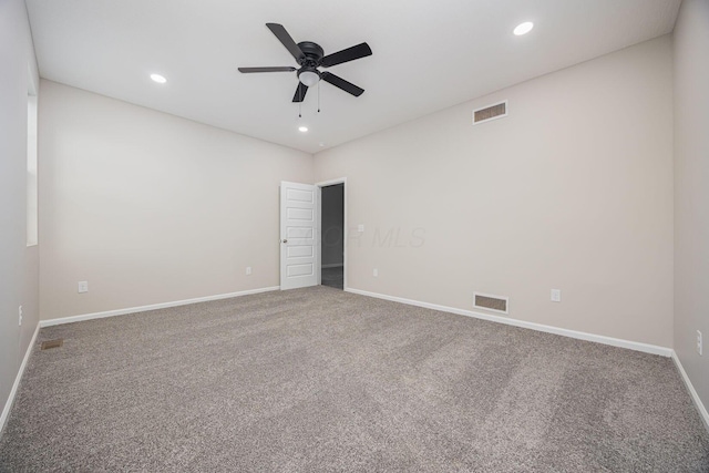 1651 Hillcrest Ave, Obetz, OH 43207 - spare room with visible vents, baseboards, ceiling fan, and carpet flooring