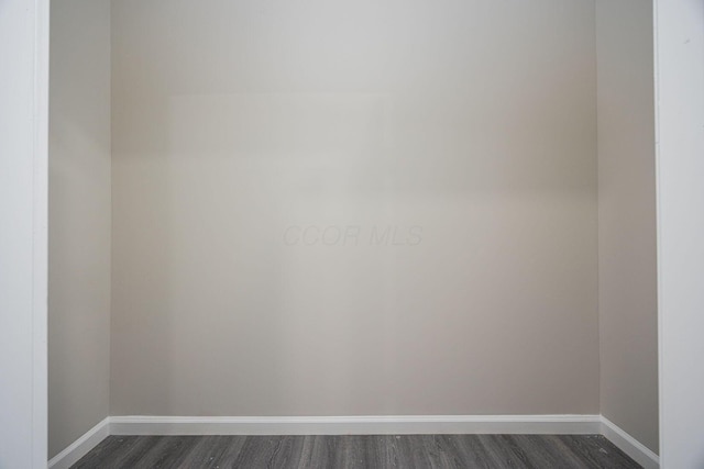 1651 Hillcrest Ave, Obetz, OH 43207 - empty room with baseboards and dark wood-type flooring