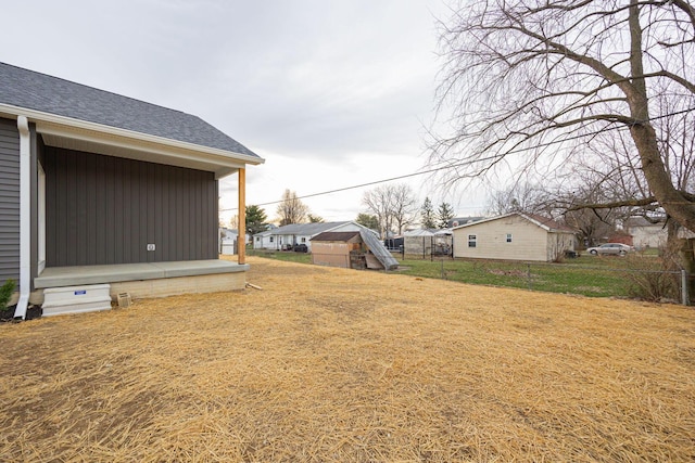 1651 Hillcrest Ave, Obetz, OH 43207 - view of yard with an outbuilding, fence, and a residential view