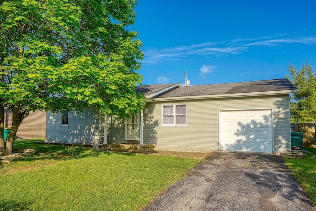 145 Danbury Rd, West Jefferson, OH 43162 - view of front of home with an attached garage, aphalt driveway, and a front lawn