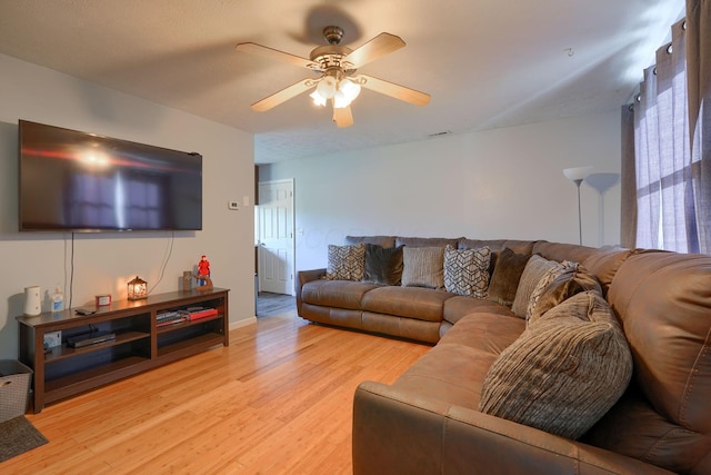 145 Danbury Rd, West Jefferson, OH 43162 - living room with light wood-type flooring, a ceiling fan, baseboards, and visible vents
