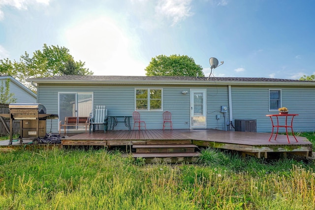 145 Danbury Rd, West Jefferson, OH 43162 - rear view of property featuring central AC unit and a wooden deck