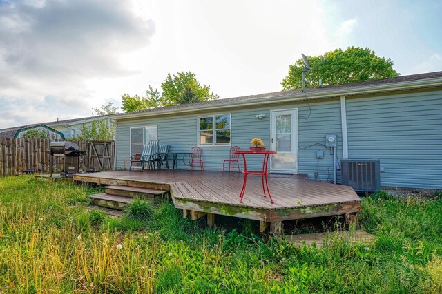 145 Danbury Rd, West Jefferson, OH 43162 - back of property featuring central air condition unit, fence, and a wooden deck