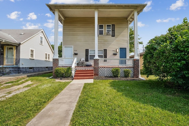 940 Leona Ave, Columbus, OH 43201 - view of front of property with covered porch and a front yard