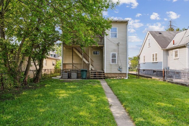 940 Leona Ave, Columbus, OH 43201 - back of property with stairway and a wooden deck