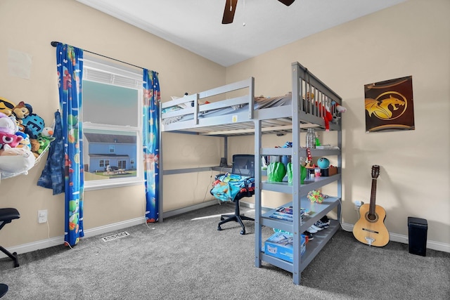 carpeted bedroom featuring baseboards, visible vents, and ceiling fan