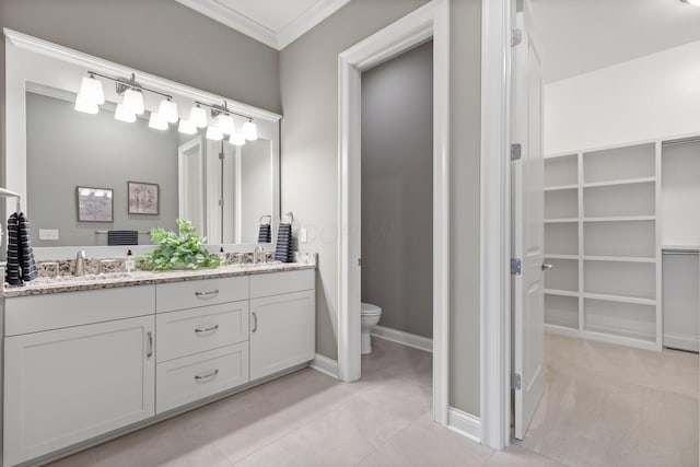 1462 Dogwood Loop, Powell, OH 43065 - full bath with crown molding, baseboards, double vanity, toilet, and a sink