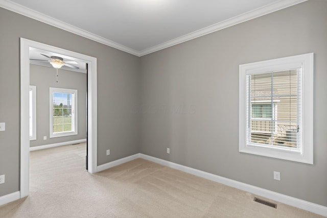 1462 Dogwood Loop, Powell, OH 43065 - empty room with baseboards, ornamental molding, visible vents, and light carpet